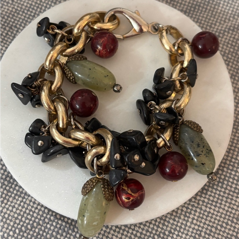 Elegant Gold and Black Charm Bracelet
